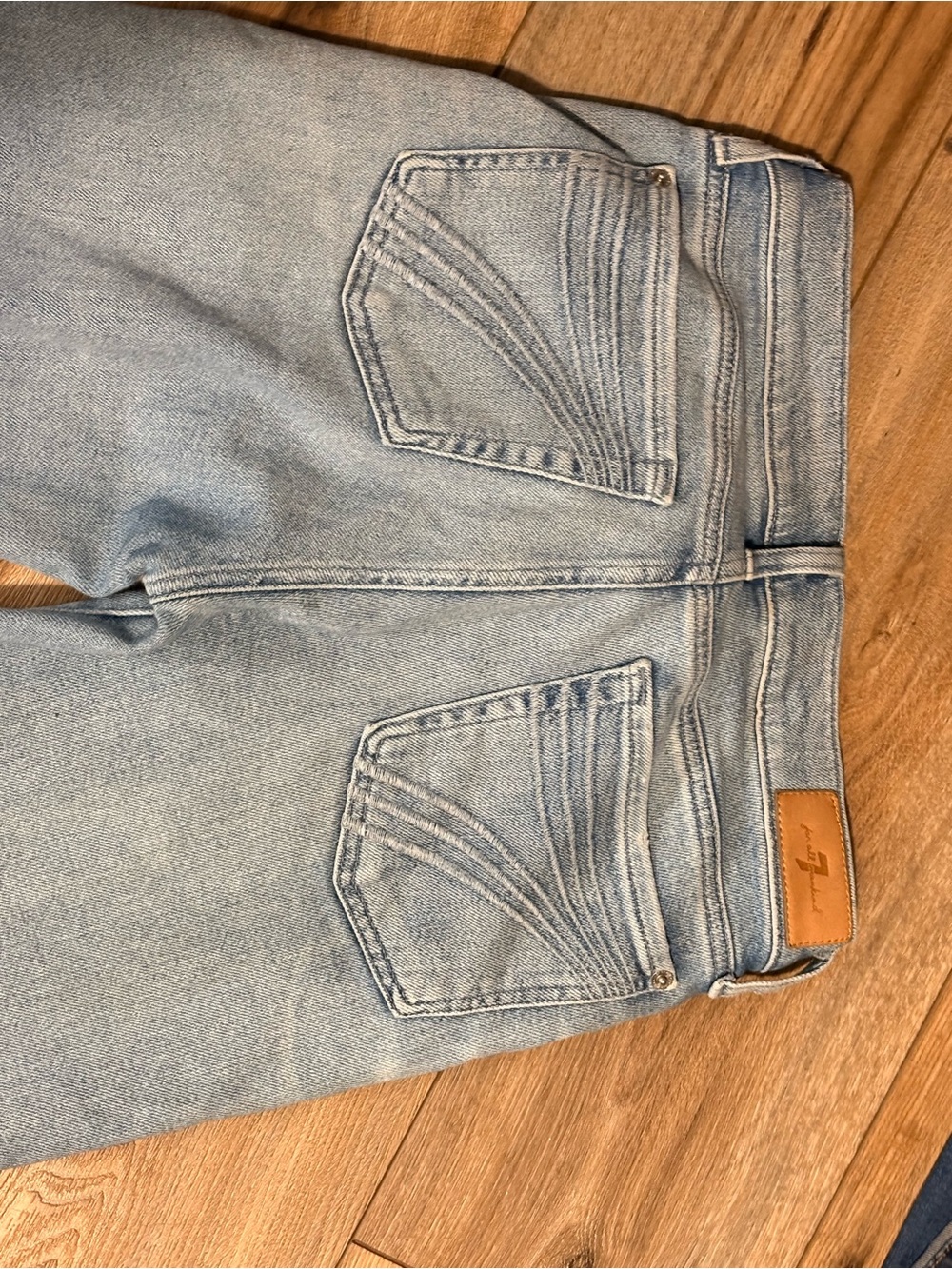 Light Wash Blue Denim Jeans with Back Pocket Stitching